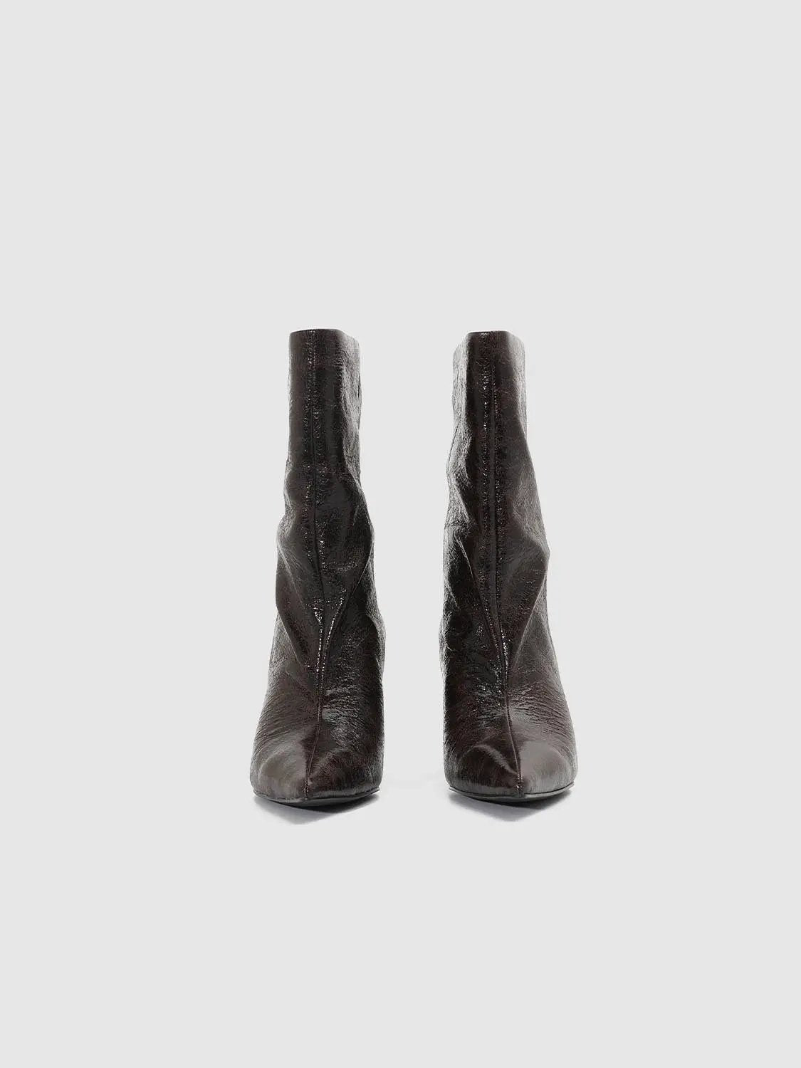 Slouchy Textured Pointed Toe Heeled Boots