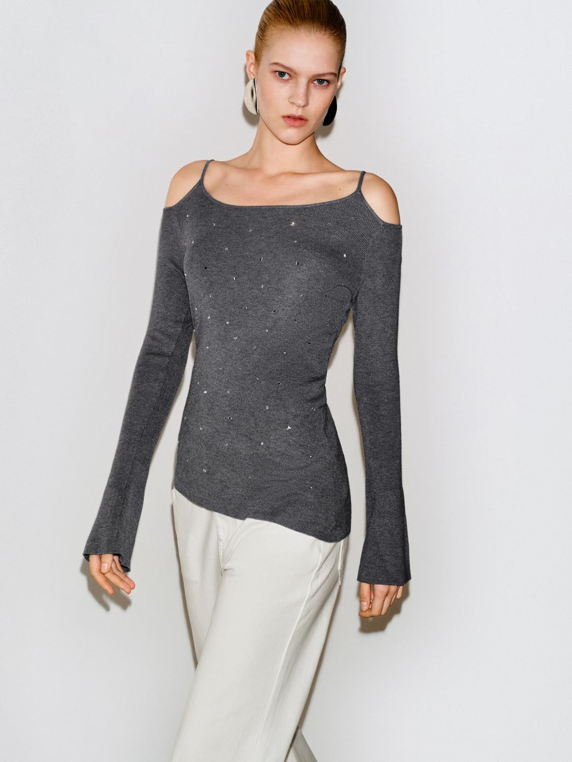 Embellished Ribbed Asymmetric Hem Long Sleeve Knit Top