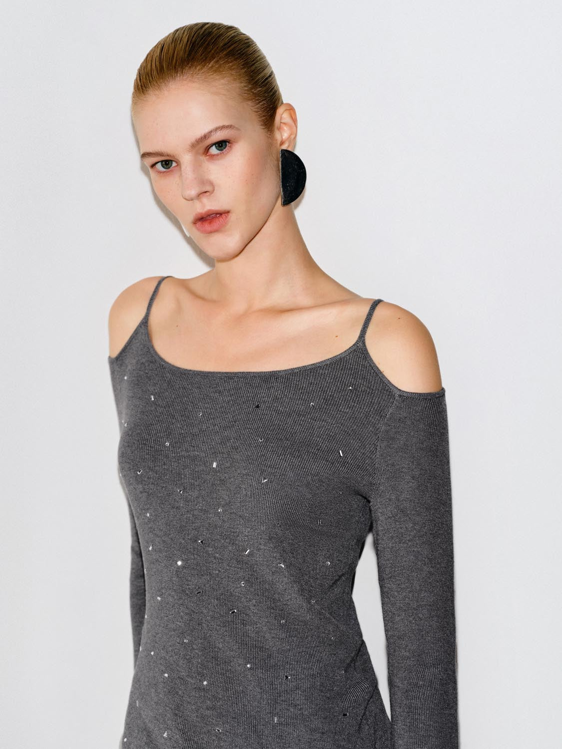 Embellished Ribbed Asymmetric Hem Long Sleeve Knit Top