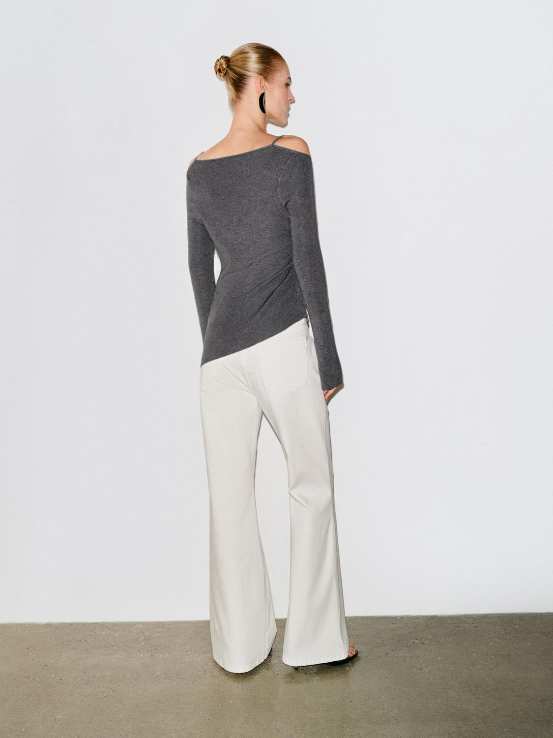 Embellished Ribbed Asymmetric Hem Long Sleeve Knit Top