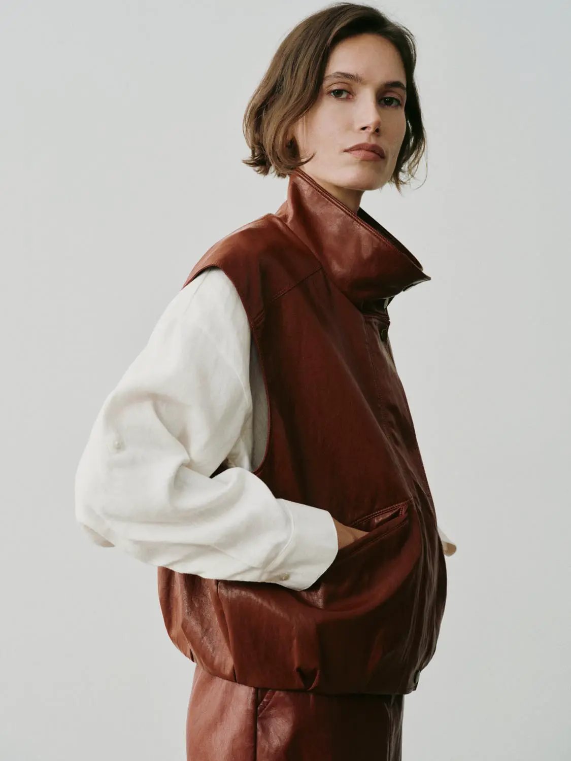 Snap Button Stand Collar Sleeveless Faux Leather Vest