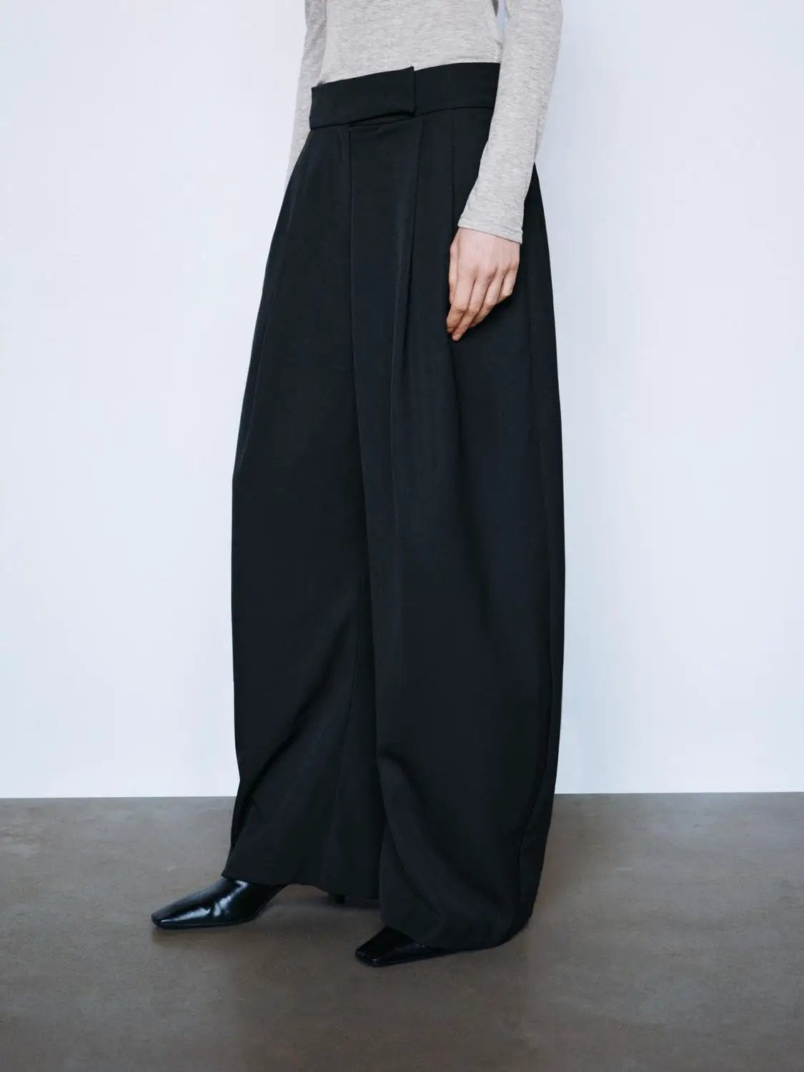 Solid Pleated High-Waisted Curved Leg Pants