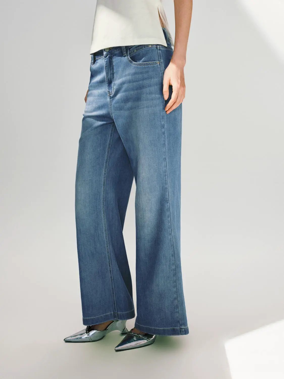 Wide-leg Cotton Blend Jeans With Subtle Wash
