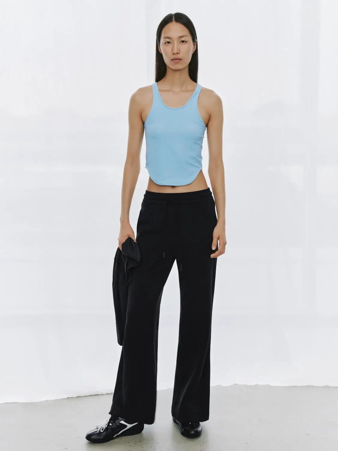 Ribbed Fitted Sleeveless Curved Hem Tank Top