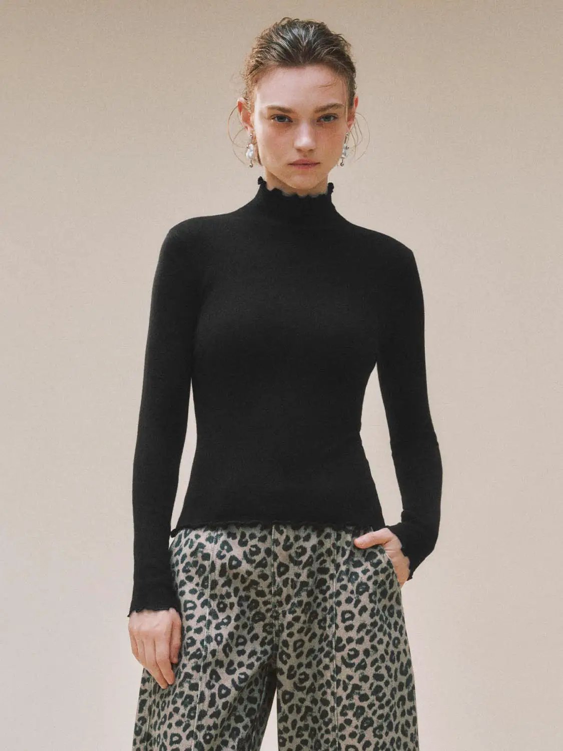 Ruffled Mock Neck Wavy Hem Long Sleeve Knit Top