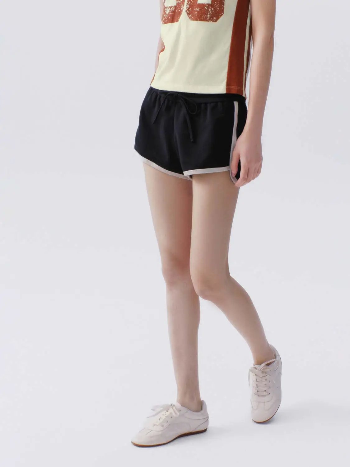 Drawstring Waist White Piping Trim Athletic Dolphin Shorts
