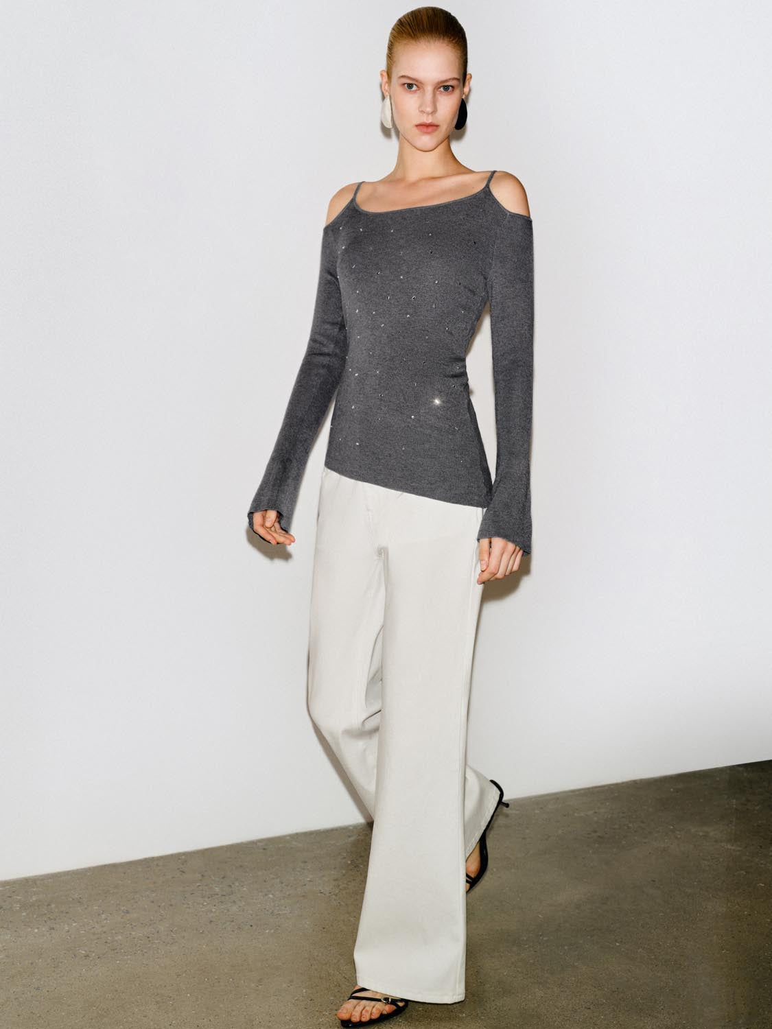 Embellished Ribbed Asymmetric Hem Long Sleeve Knit Top