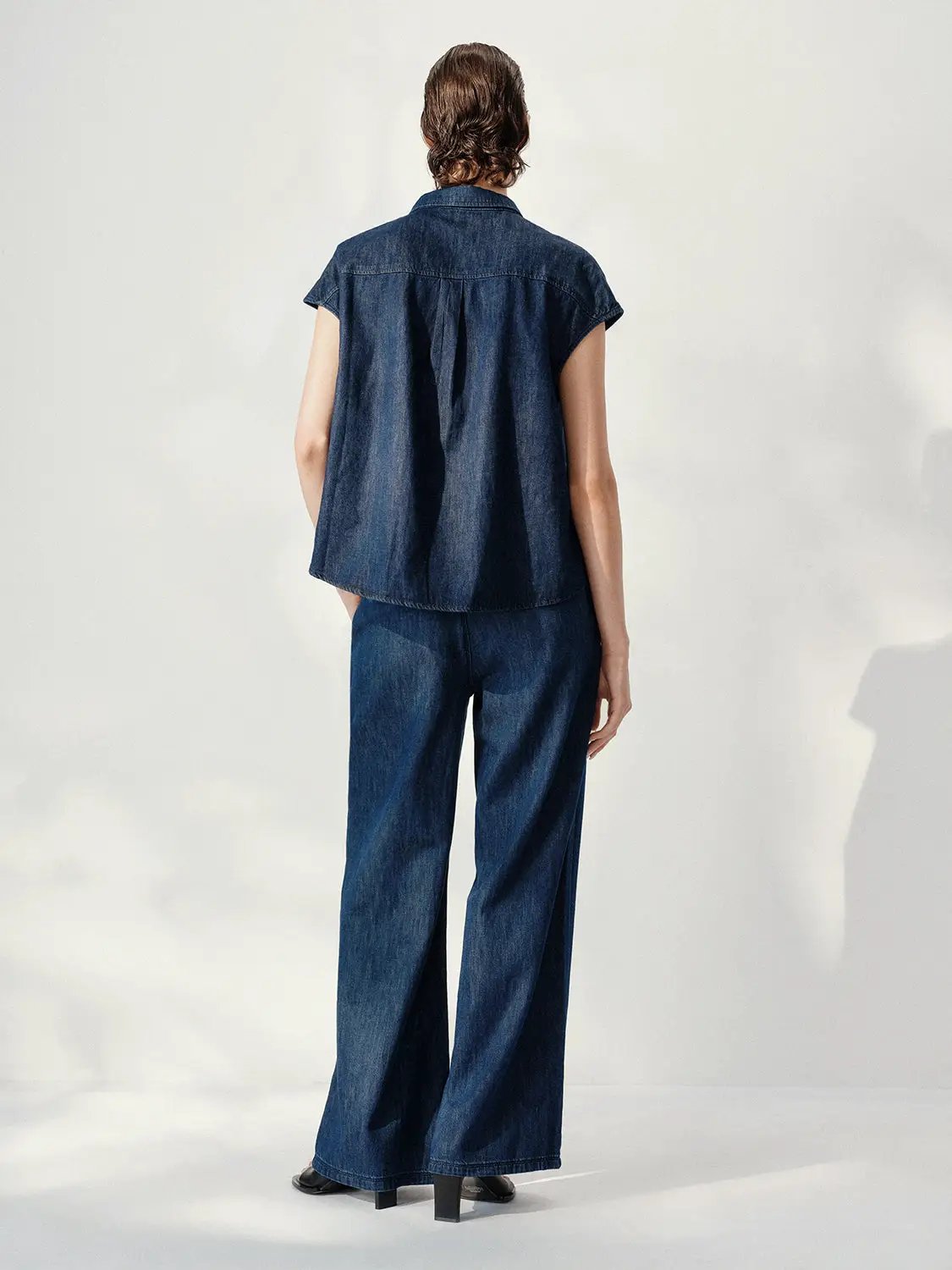 Point Collar Asymmetric Hem Sleeveless Cotton Denim Shirt