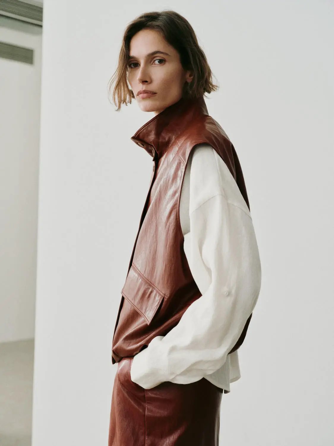 Snap Button Stand Collar Sleeveless Faux Leather Vest