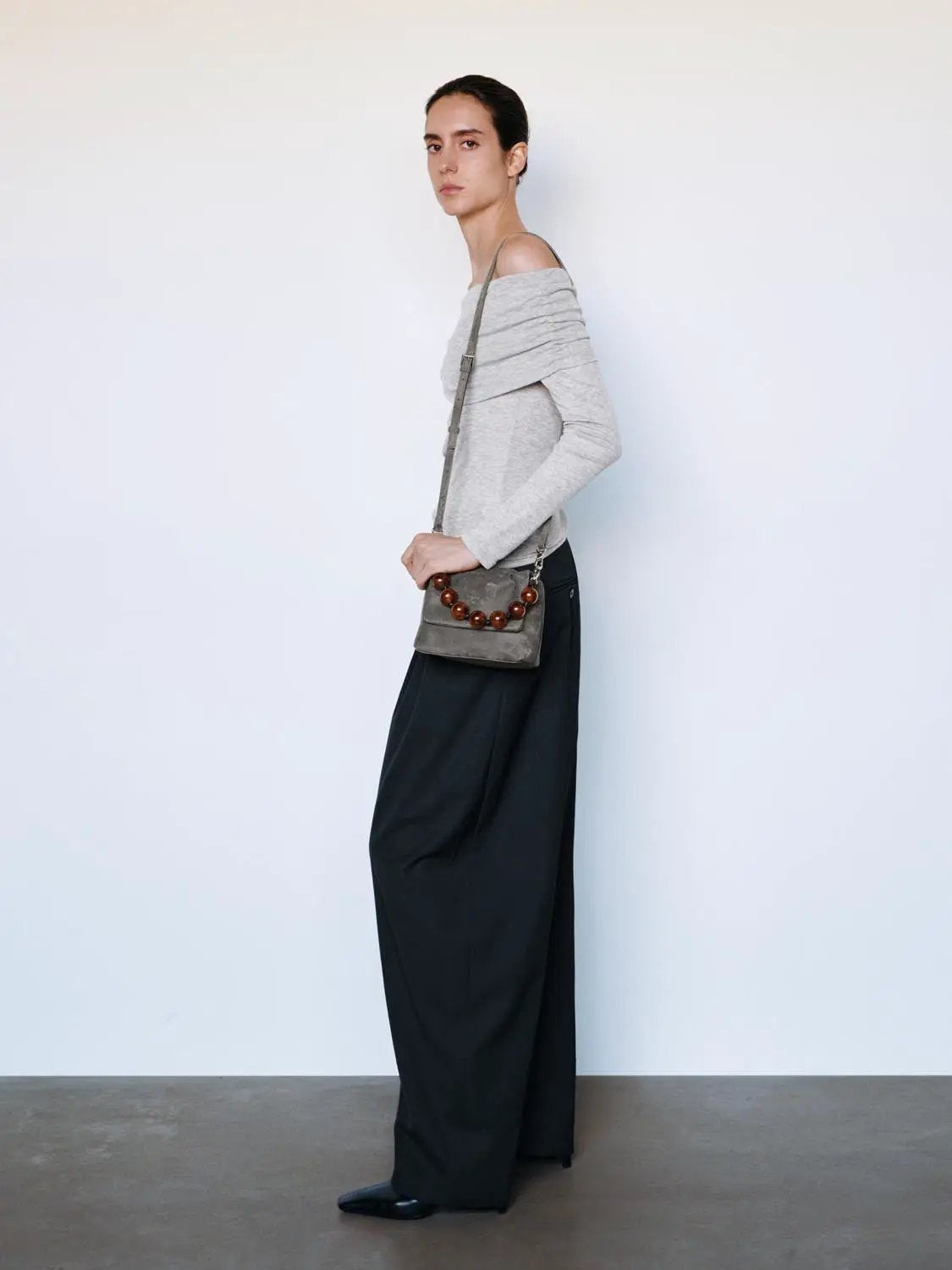 Solid Pleated High-Waisted Curved Leg Pants