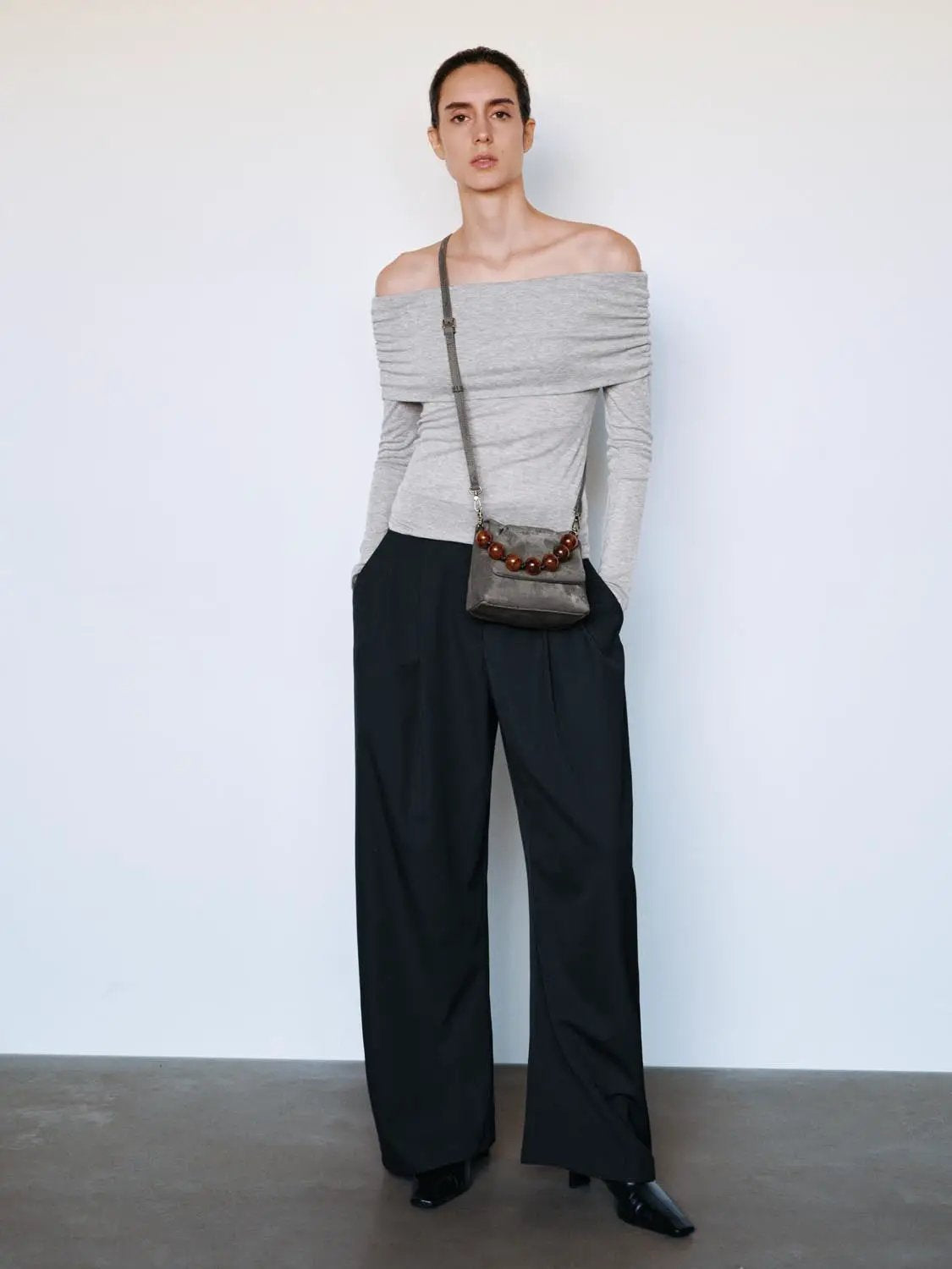 Solid Pleated High-Waisted Curved Leg Pants