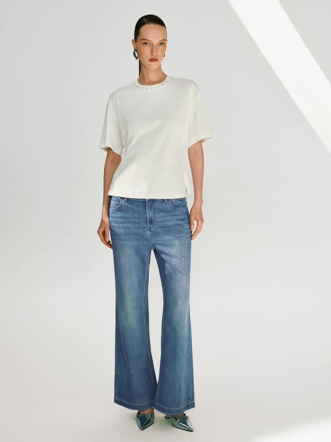 Wide-leg Cotton Blend Jeans With Subtle Wash