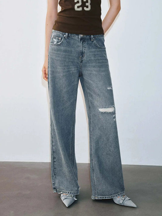 Mid Wash Distressed Raw Edge Relaxed Flare Leg Denim Jeans