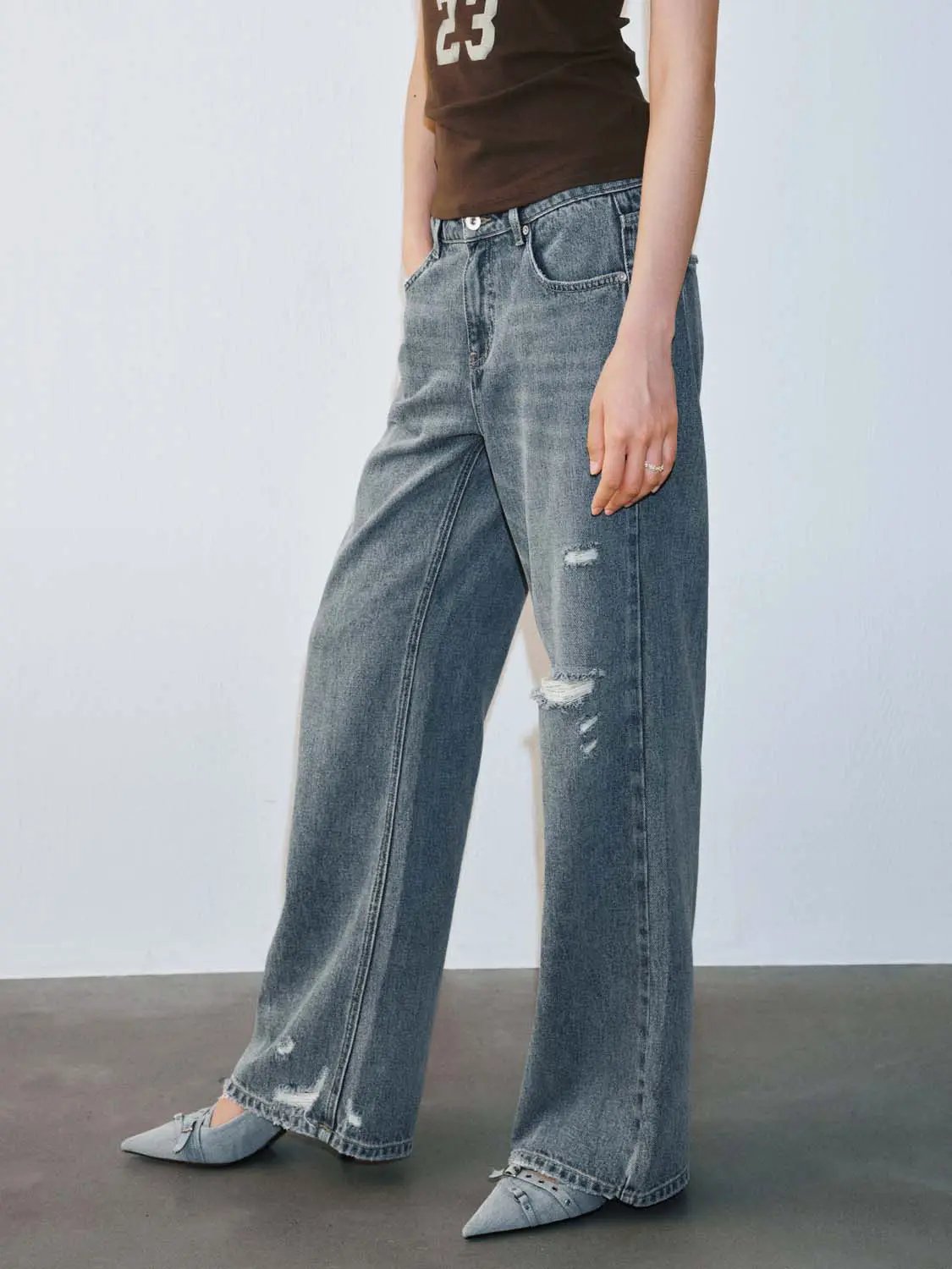 Mid Wash Distressed Raw Edge Relaxed Flare Leg Denim Jeans